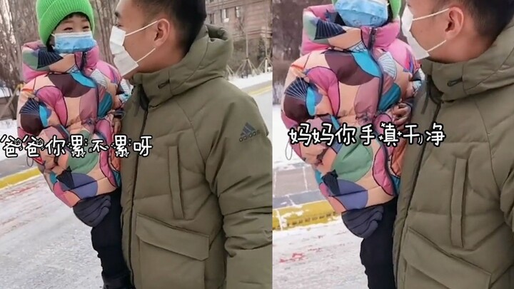 The daughter felt sorry for her father carrying the baby and the bag, so she turned her head and pra