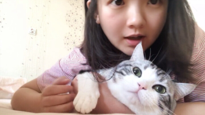 A cat stays up late at night and is caught by its owner secretly doing this...