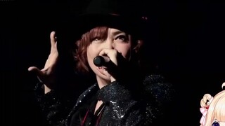 Watch the live version of Kamen Rider Ryuki's OP: This singer sings really well, I like her angry vo