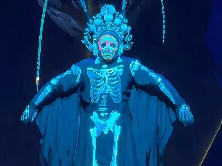 A face-changing master transforms his outfit and facial expressions in a split second, leaving the a