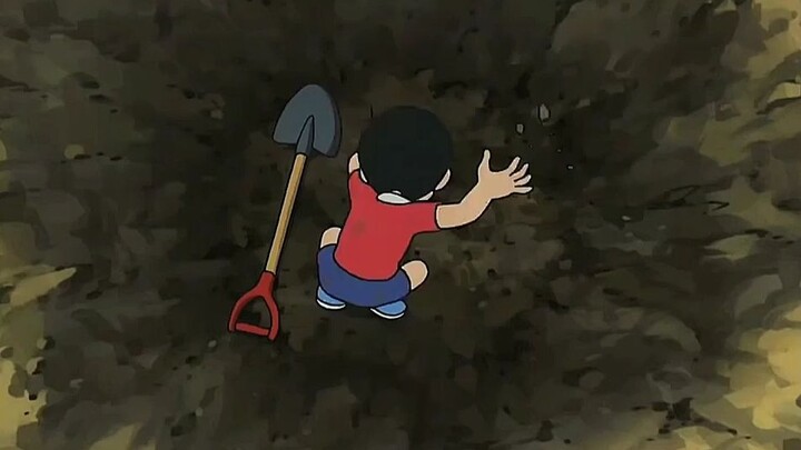 Nobita menggali telur dinosaurus dan Dora membantunya menetaskan dinosaurus.