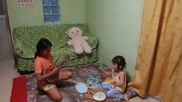 my daughter and my niece playing instrument