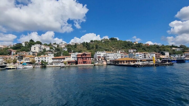 Cruising past historic waterfront mansions and lush hills along the sunny Bosphorus. 🌊☀️