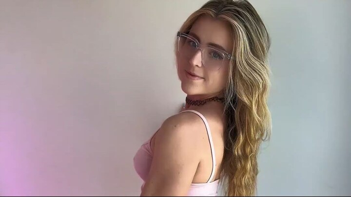 stretching in a mini skirt