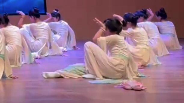 The middle school dance team’s performance featured the entire troupe barefoot in white socks, with 