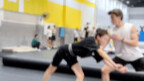 The side flip transitions from the air cushion to the floor. Everyone's mood changes from nervousnes