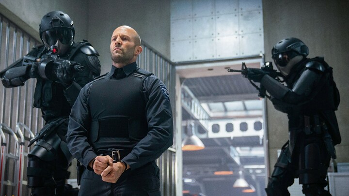 The man was clearly a security guard escorting cash—but when he encountered robbers, he actually too