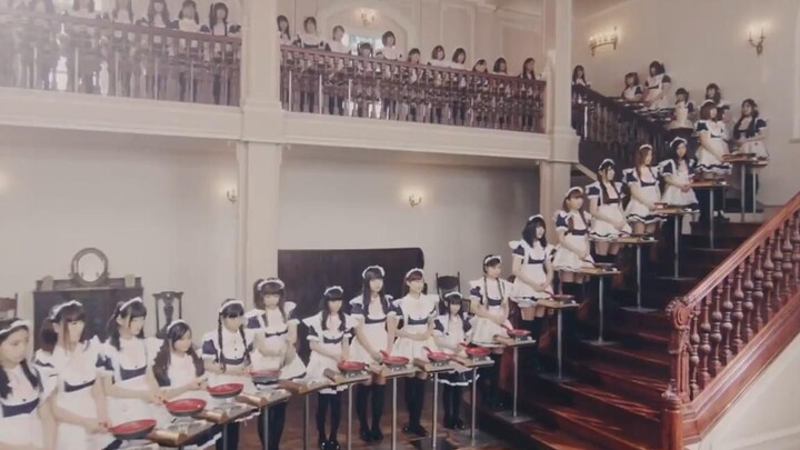 Japanese sand sculpture advertisement: If you have 100 Japanese maids at home