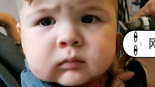 The chubby mixed-race baby looks like Crayon Shin-chan. When getting a haircut, his round face turns