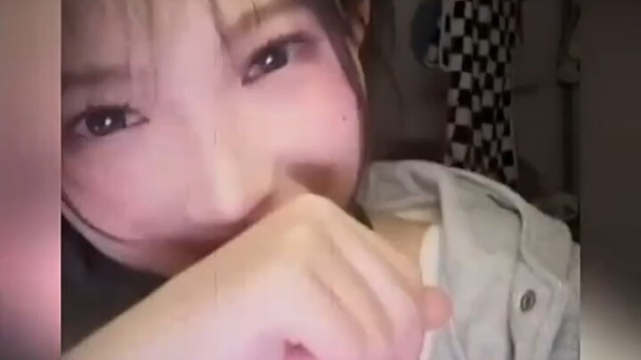 What is she laughing at?