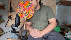GERMAN ASMR - EATING LARGEST RAINBOW LOLLIPOP WITHOUT USING HANDS & COUNTING TO