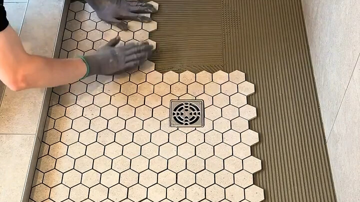 Mosaic tiling in the shower area