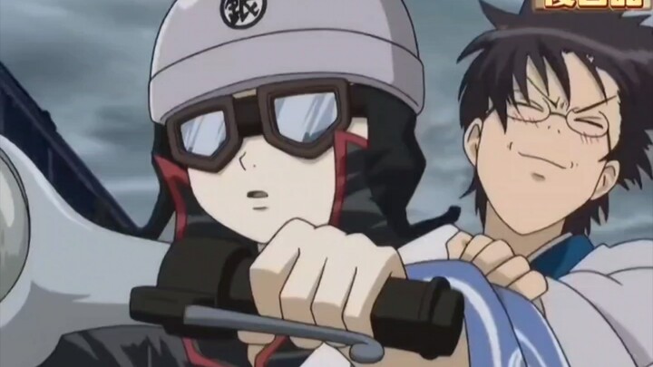 Kagura hops on Gintoki’s little donkey and takes Shinpachi with her as they take off.