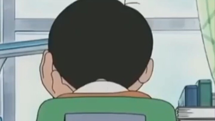 nobita pusing memikirkan dunia