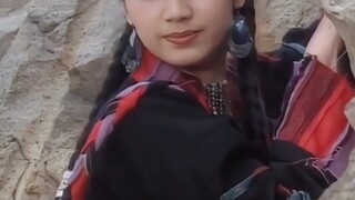 Who wasn't a bright beauty when they were young! She appeared in exotic costumes, cute and playful