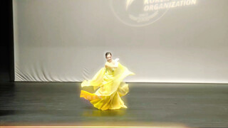 With each breath, the skirt blooms, and the gracefulness is embodied.