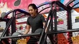 A GUY DUNKING INSIDE THE ARCADE