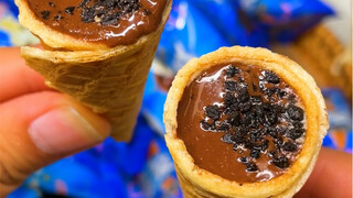 #Cookie Chocolate Cone The cone is packed with chocolate and bursting filling; one bite and the crea