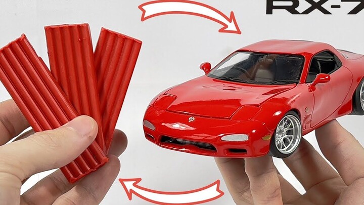 Memakan waktu total 130 jam, sebuah model Mazda RX‑7 dibuat dari sebongkah plastisin berwarna merah