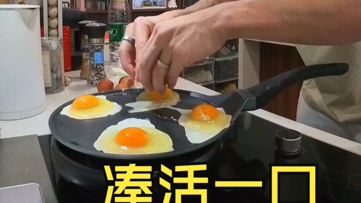 Chen enjoys a sit-down breakfast, easily scarfing down four eggs!