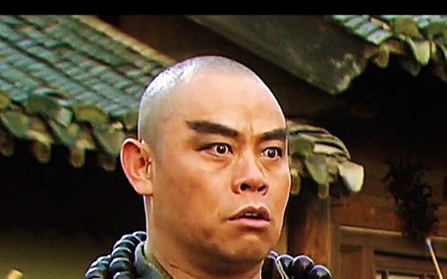 The master gives Lu Zhishen a Buddhist staff.