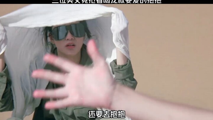 Three beautiful ladies are all vying to get a loving hug from Uncle Long!