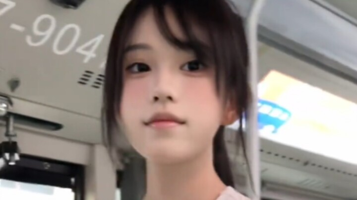 How should you strike up a conversation with a girl like this on the bus?