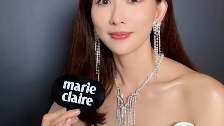 Lin Chi-ling in a deep-V interview—how’s she looking?
