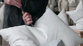 Norwegian artist carves white marble into "fluffy and soft" pillows—so cool!