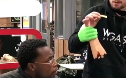 Pranking passersby with a prosthetic hand