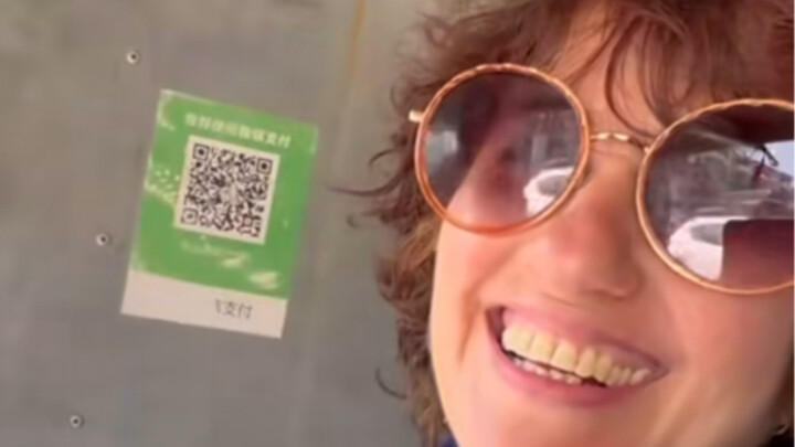 [Germany’s Tao Yuanming] Old Horse Martina rides a Chinese electric three-wheeler—wonder what destin