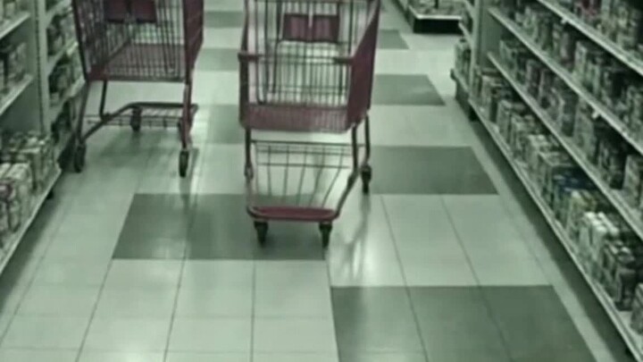 The store was empty at 2:04 AM. Then the cart started moving by itself. #shorts
