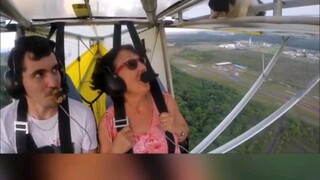 A pilot was flying high when he suddenly spotted a cat on his wing...