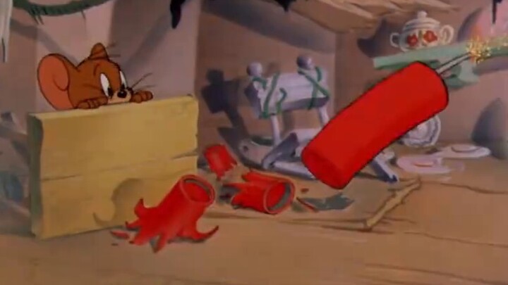 The cousin feeds Tom the black boss firecrackers