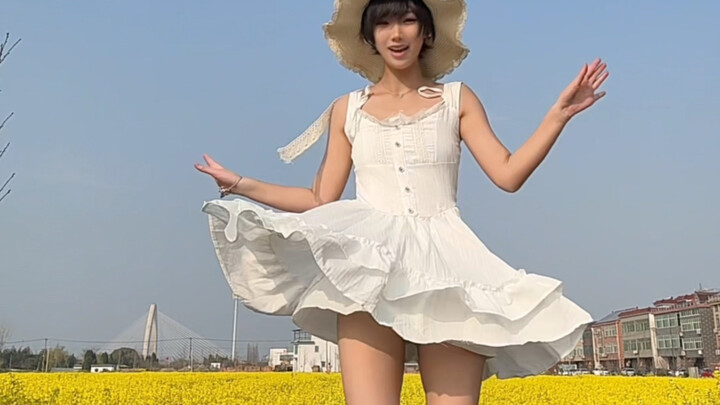 Rapeseed Flower Girl in the City and Countryside