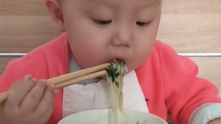 The cutest baby is the one who is not picky about food and eats seriously