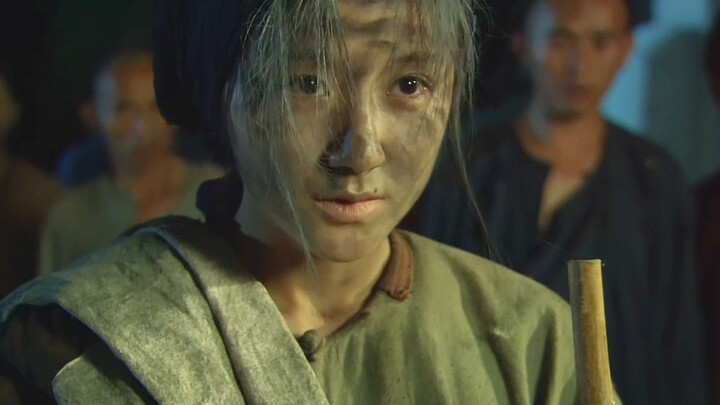 During a devastating famine, corpses littered the fields. Guanyin transformed into a beggar woman to