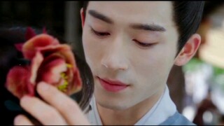 I can't stop laughing!! He has a big flower on his head to judge people. It's because the flower was