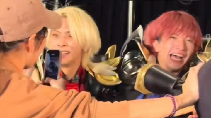 Japanese male idol group soliciting customers on the street
