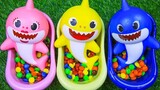Bathe three baby sharks with rainbow candies