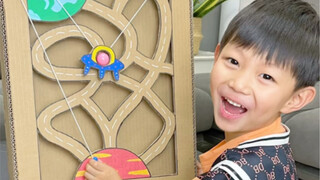 I made a space travel maze for my child using waste cardboard boxes. It was a bit difficult to opera