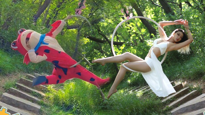 A red frog with a white skirt in the summer woods?