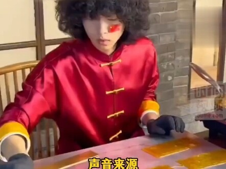 Zhengzhou, Henan. Pewaris cantik seni lukis gula memberikan ucapan selamat penuh manis, membentuk Ti