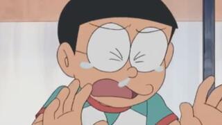 Câu cửa miệng của Nobita " GIÚP MÌNH ĐI DOREMON"