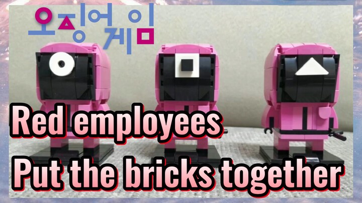 Red employees Put the bricks together
