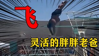 身材无法限制梦想实现：热爱跳水的老爸受到比赛全场关注