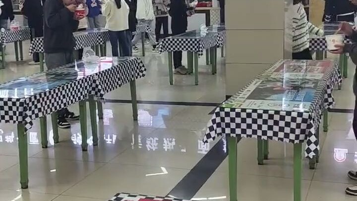 A university cafeteria’s unique feature: you eat standing up—no chairs provided!