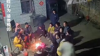 A family sits together by the fire on New Year's Eve, and the next second the bonfire explodes, scat