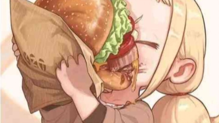 The little girl who is eating a hamburger
