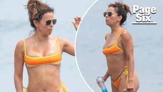 Eva Longoria shows some skin in a cheeky bikini on Spanish beach